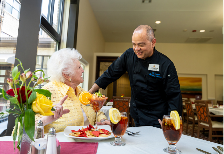 Resident Being Served by Chef in an Independent Living Facility Dining Room Resident Being Served by Chef in an Independent Living Facility Dining Room